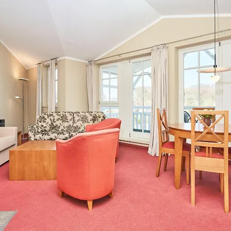 In A Lakeside Park In With A Balcony *