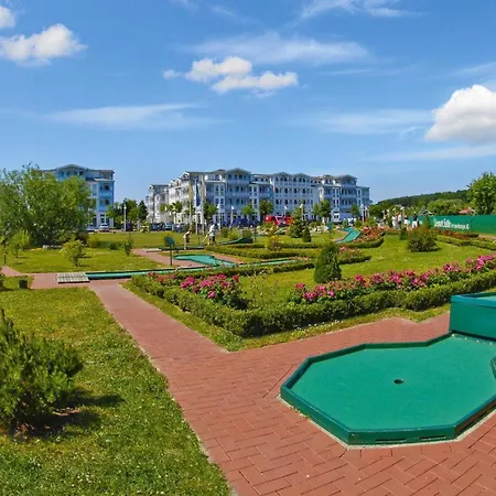 In A Lakeside Park In With A Balcony